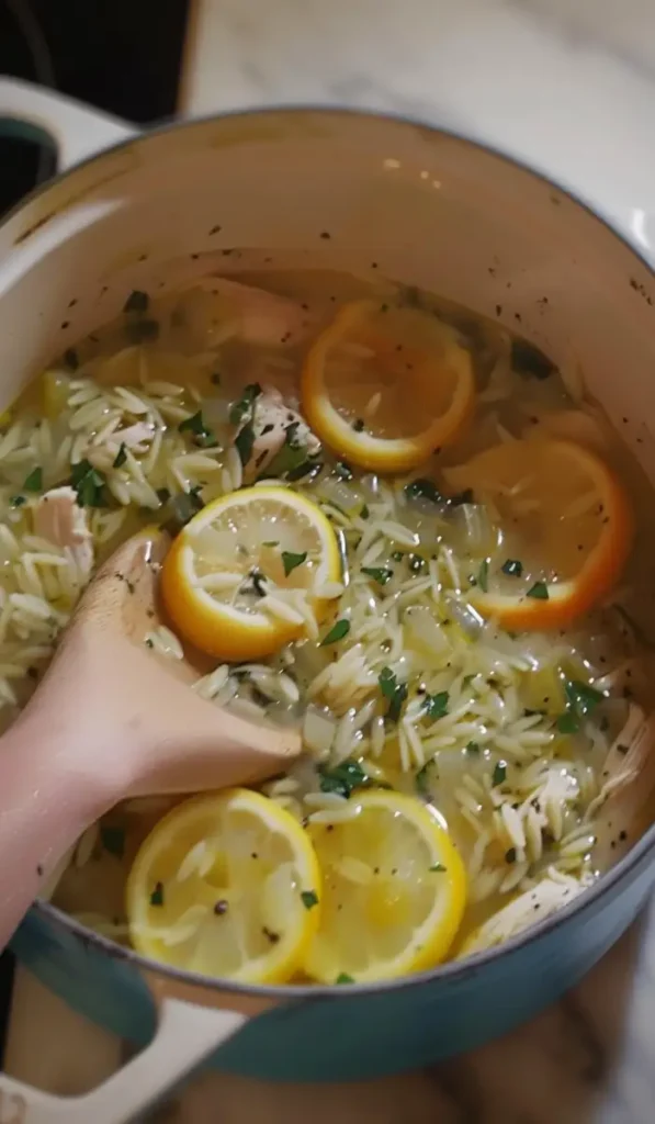 lemon chicken orzo soup cooking in one pot